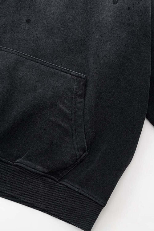Distressed Gradient-Wash Splatter-Graphic Pullover Hoodie in Black - hem detail
