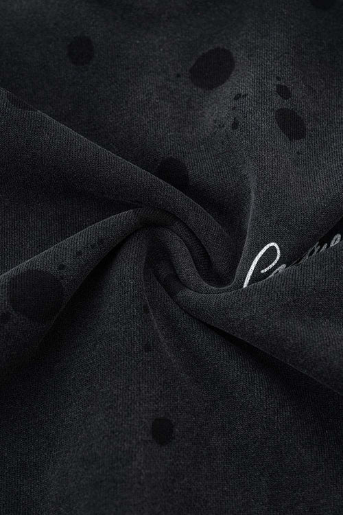 Distressed Gradient-Wash Splatter-Graphic Pullover Hoodie in Black - graphic detail