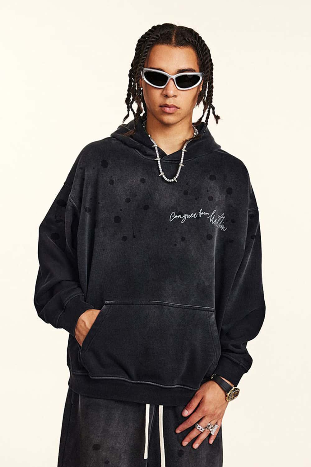 Distressed Gradient-Wash Splatter-Graphic Pullover Hoodie in Black - front modeled view