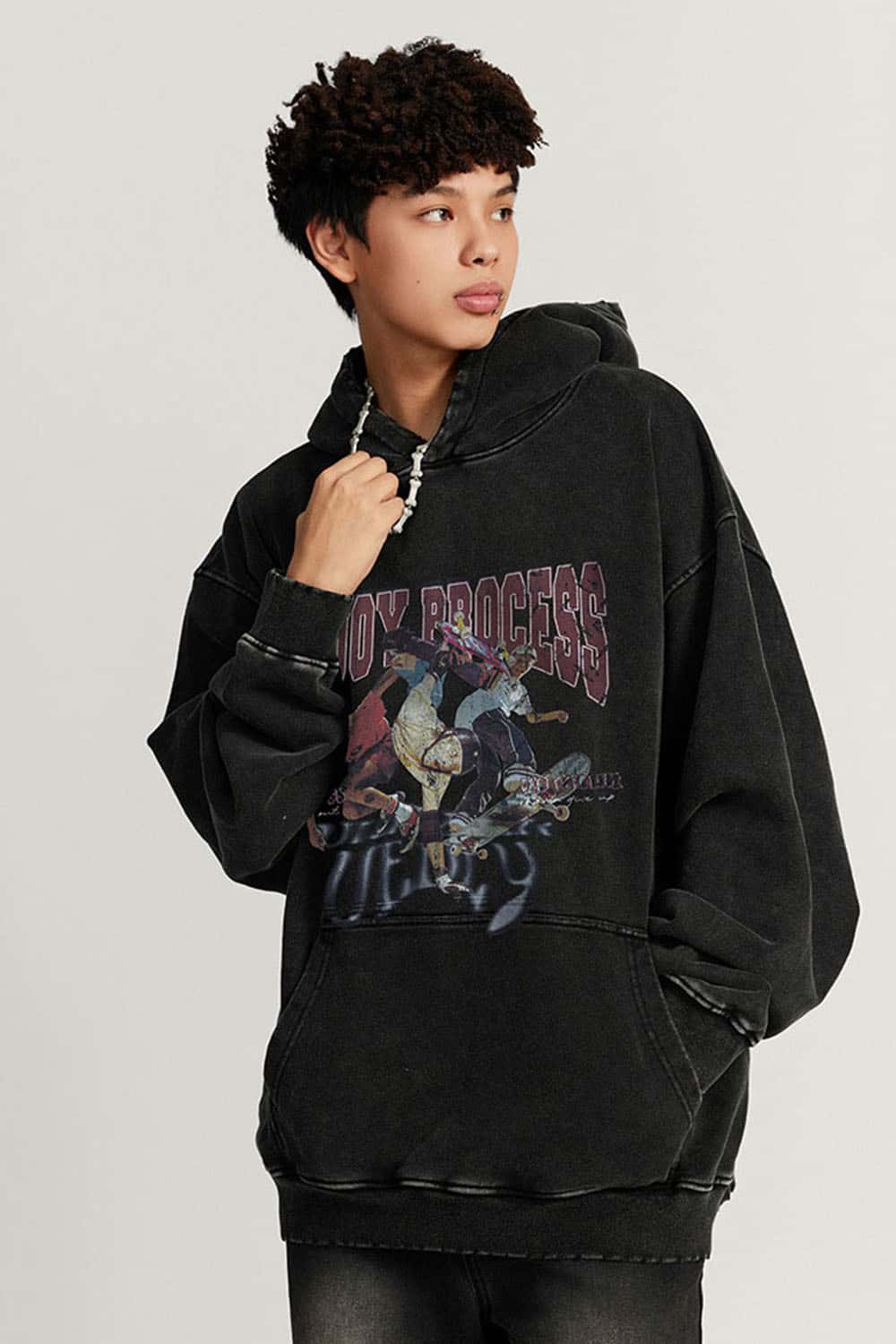 Heavyweight Washed Skateboarder-Graphic Cotton Pullover Hoodie in Fried Snowflakes - three-quarter front modeled view