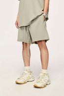 Heavyweight Cotton Relaxed-Fit Drawstring Shorts in Sand - waistband detail