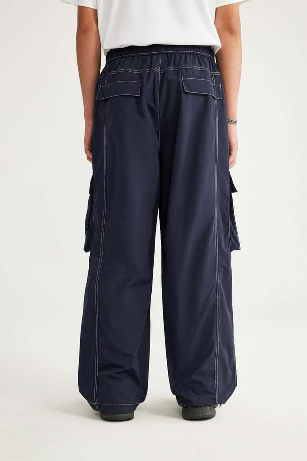Waterproof Multi-Pocket Wide-Leg Cargo Pants in Navy Blue - full-length back modeled view