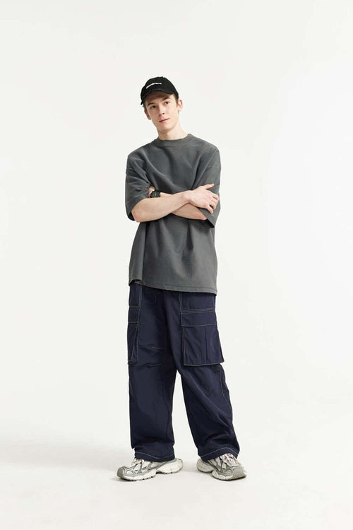 Waterproof Multi-Pocket Wide-Leg Cargo Pants in Navy Blue - full-length front modeled view