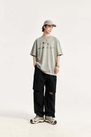 Convertible Multi-Pocket Cargo Pants in Black - full-length front modeled view
