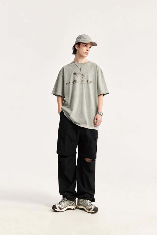 Convertible Multi-Pocket Cargo Pants in Black - full-length front modeled view