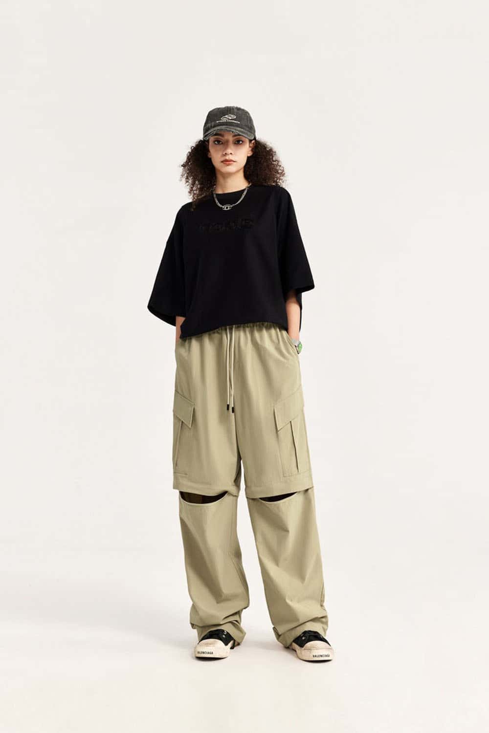 Convertible Multi-Pocket Cargo Pants in Khaki - full-length front modeled view