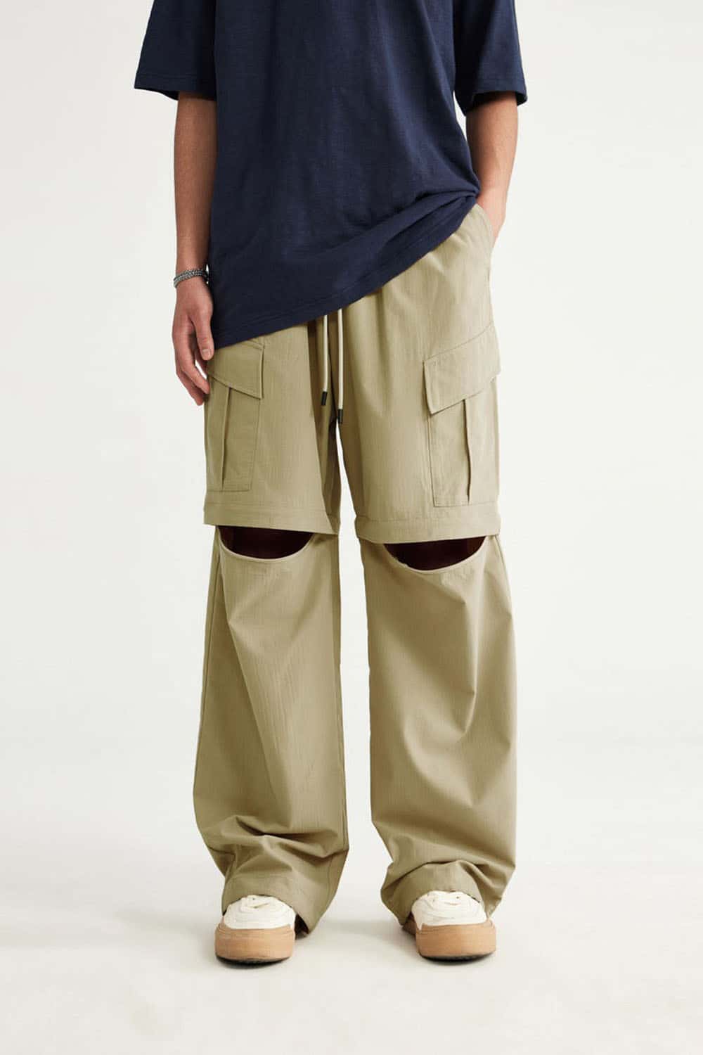 Convertible Multi-Pocket Cargo Pants in Khaki - full-length front modeled view