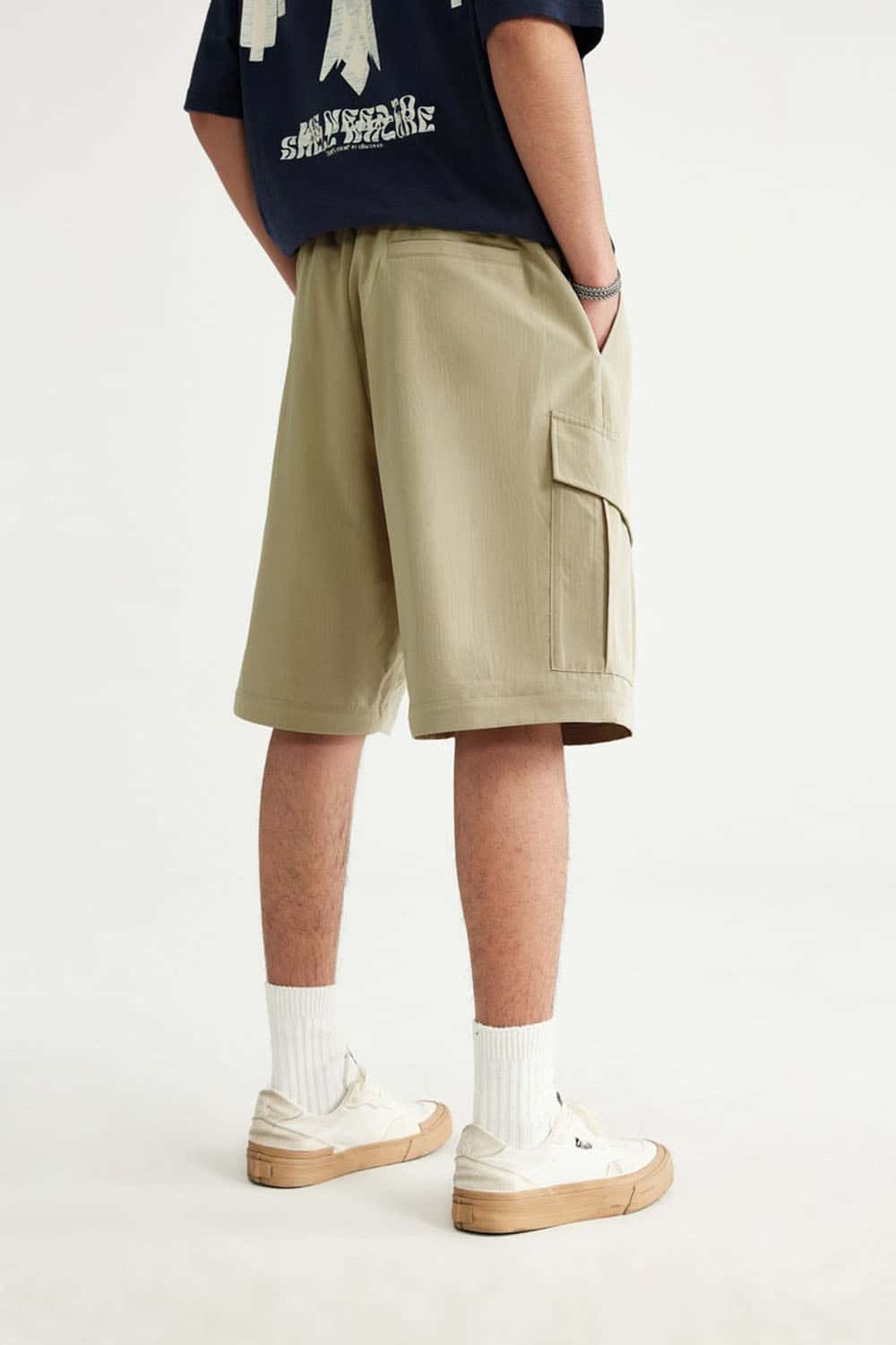 Convertible Multi-Pocket Cargo Pants in Khaki - full-length back modeled view