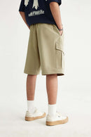 Convertible Multi-Pocket Cargo Pants in Khaki - full-length back modeled view