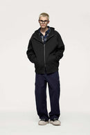 Waterproof Windproof Scuba-Knit Hooded Jacket in Black - full-length front modeled view