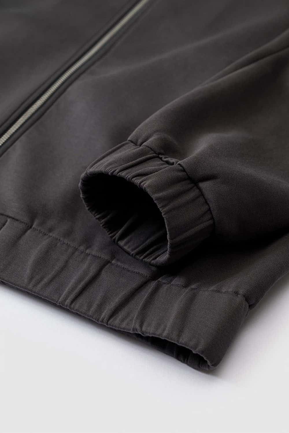 Waterproof Windproof Scuba-Knit Hooded Jacket in Dark Gray - cuff and hem detail