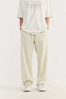 Heavyweight Cotton-Blend Relaxed Straight-Leg Sweatpants in Rice Apricot - front modeled view