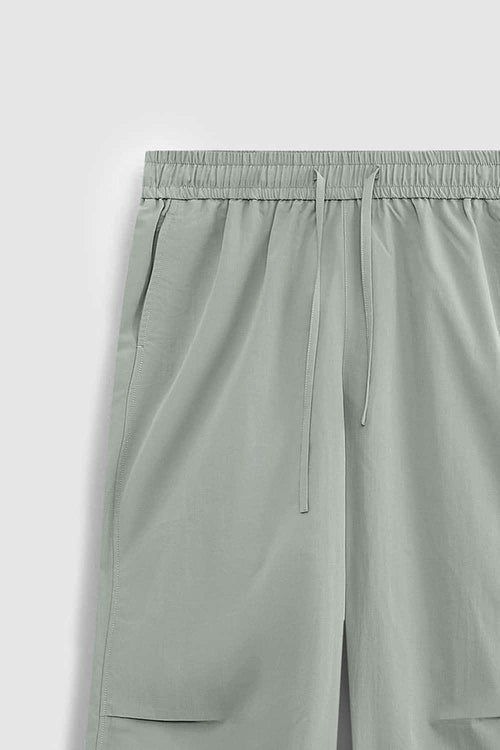 Layered-Pocket Drawstring Wide-Leg Pants in Grayish Green - waistband and drawstring detail