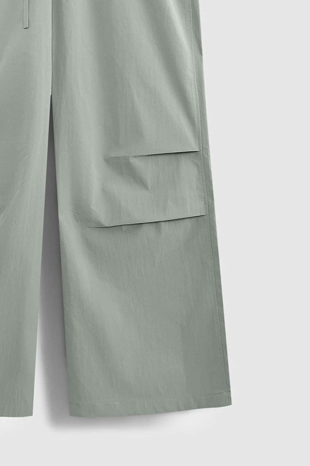 Layered-Pocket Drawstring Wide-Leg Pants in Grayish Green - front flat lay product view