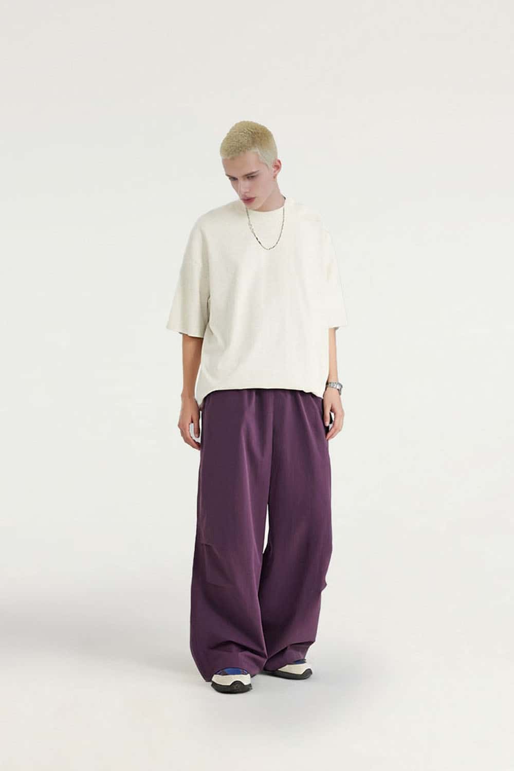 Layered-Pocket Drawstring Wide-Leg Pants in Purple - full-length front modeled view