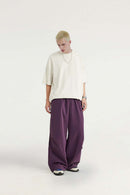 Layered-Pocket Drawstring Wide-Leg Pants in Purple - full-length front modeled view