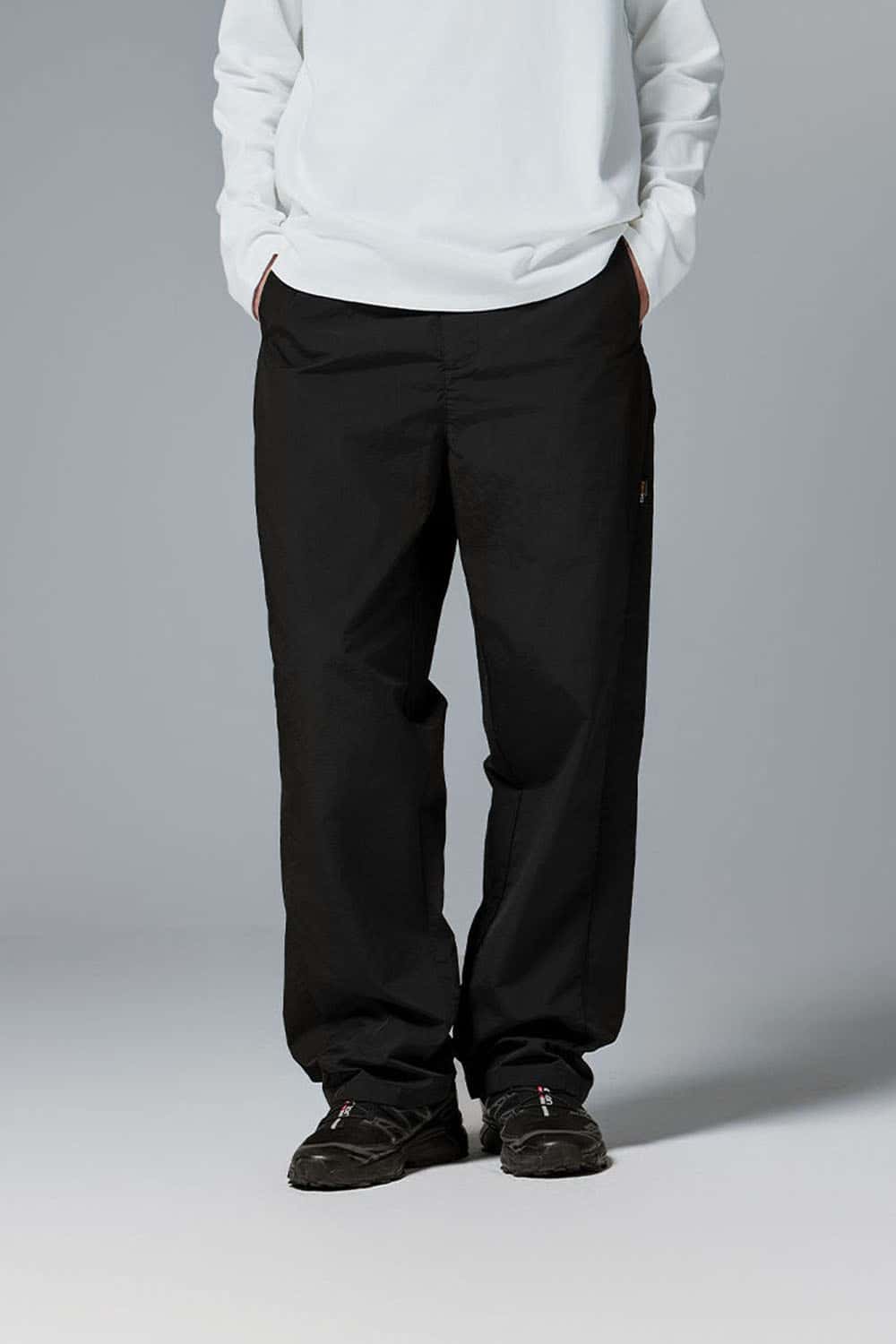 Abrasion-Resistant CORDURA Straight-Leg Cargo Pants in Black - front modeled close-up