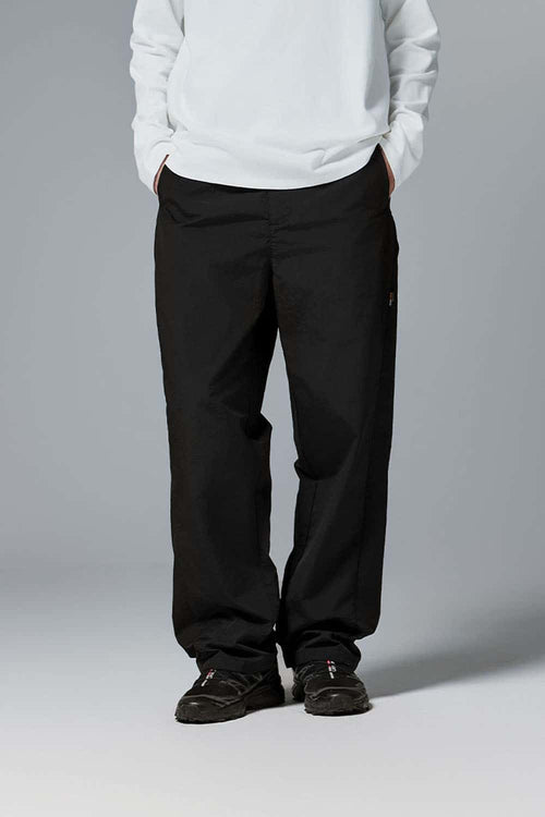 Abrasion-Resistant CORDURA Straight-Leg Cargo Pants in Black - front modeled close-up