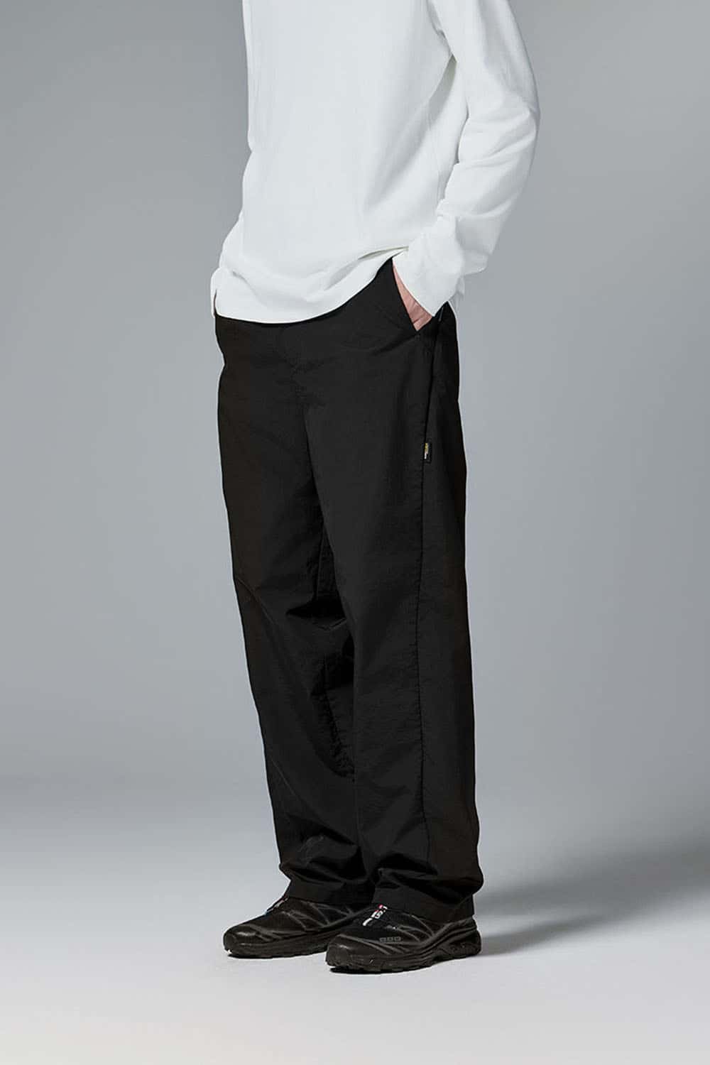 Abrasion-Resistant CORDURA Straight-Leg Cargo Pants in Black - three-quarter front modeled view