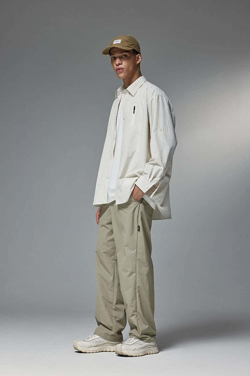 Abrasion-Resistant CORDURA Straight-Leg Cargo Pants in Trunk Brown - three-quarter front modeled view