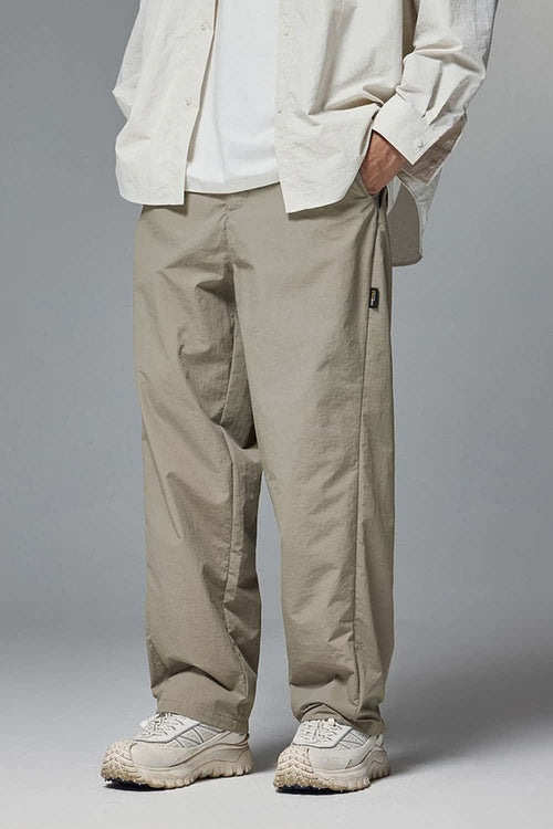Abrasion-Resistant CORDURA Straight-Leg Cargo Pants in Trunk Brown - front modeled close-up