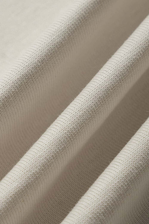 Layered-Collar Puff-Print Graphic Long-Sleeve T-Shirt in Apricot - fabric texture close-up