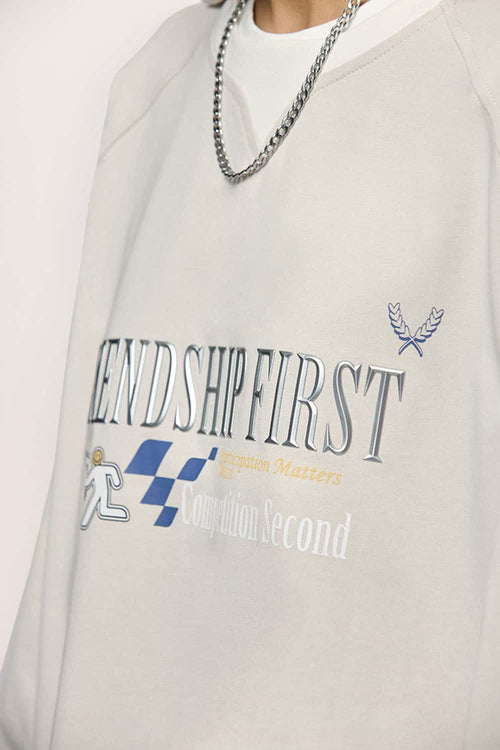 Layered-Collar Puff-Print Graphic Long-Sleeve T-Shirt in Apricot - product detail close-up
