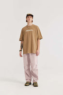 Breathable Multi-Pocket Straight-Leg Utility Pants in Grayish Pink - full-length front modeled view