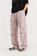 Breathable Multi-Pocket Straight-Leg Utility Pants in Grayish Pink - front modeled view