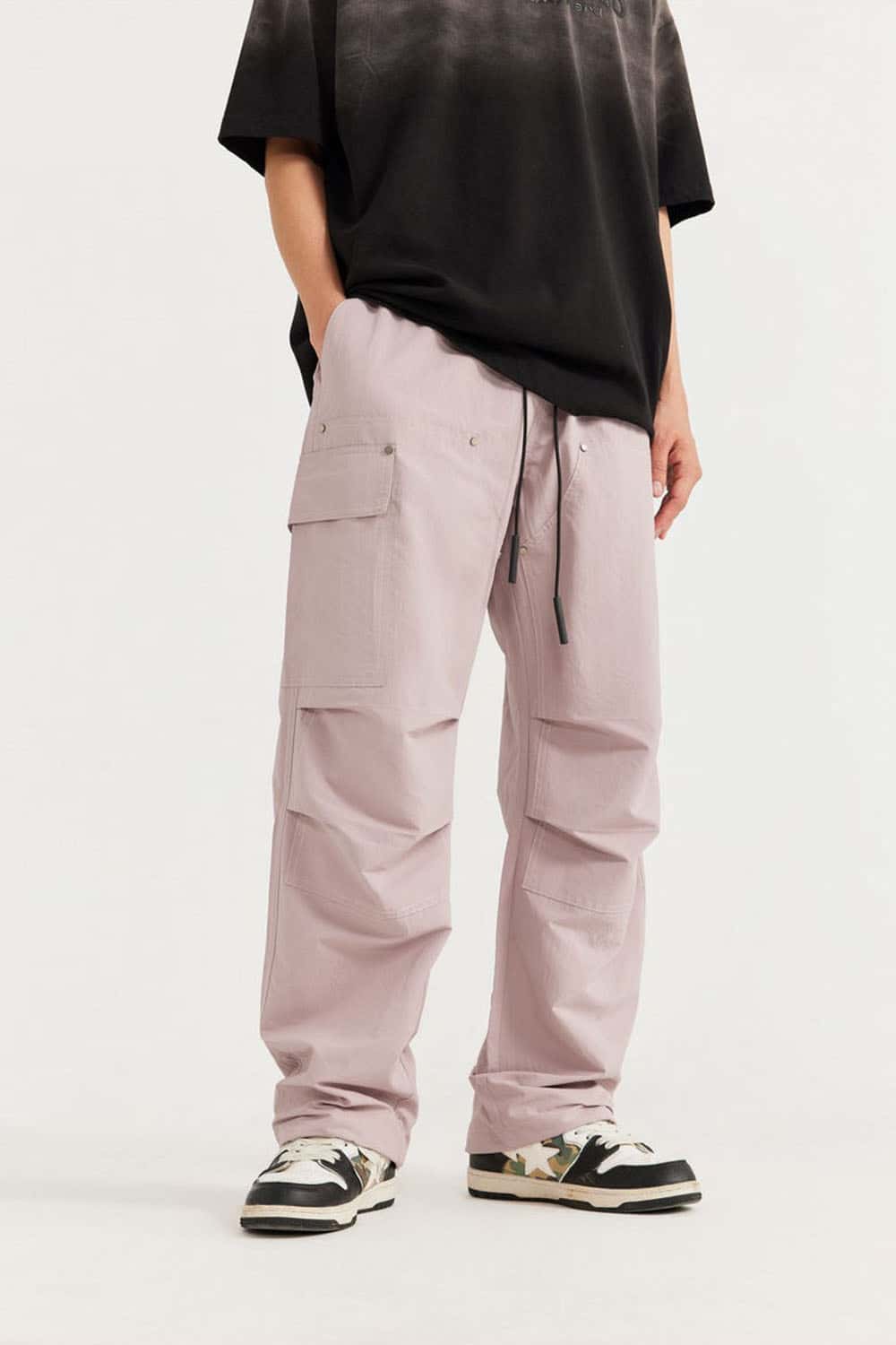 Breathable Multi-Pocket Straight-Leg Utility Pants in Grayish Pink - front modeled view