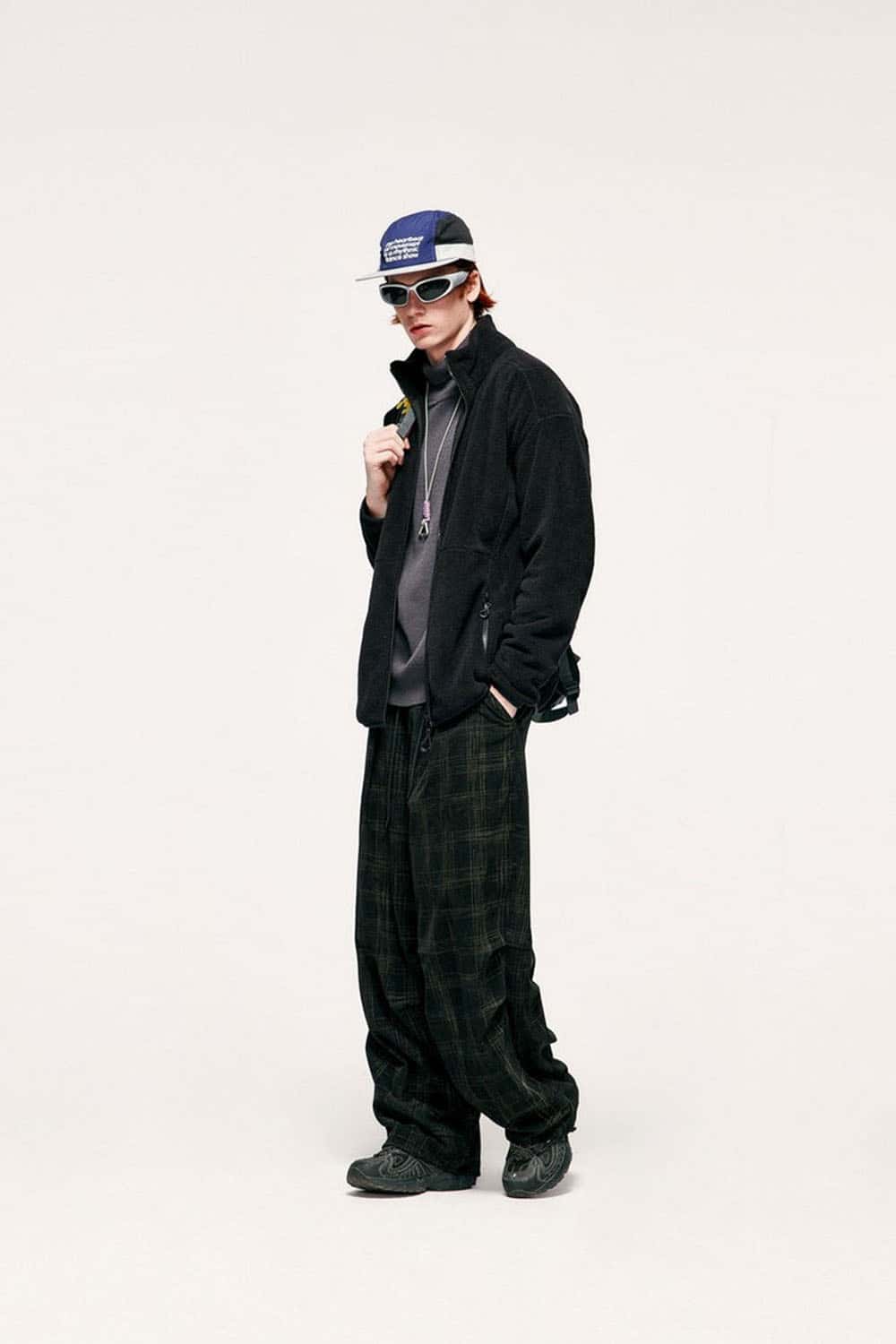 Windproof Brushed Polyester Fleece Stand-Collar Zip Jacket in Black - three-quarter front modeled view