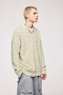 Abrasion-Resistant Flecked Geometric-Knit Crewneck Sweater in Apricot - three-quarter front modeled view