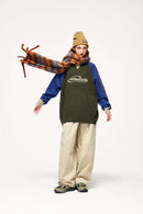 Warm Flecked-Knit Panelled Raglan Graphic Sweater in Military Green - full-length front modeled view
