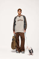Warm Flecked-Knit Panelled Raglan Graphic Sweater in Sand - full-length front modeled view