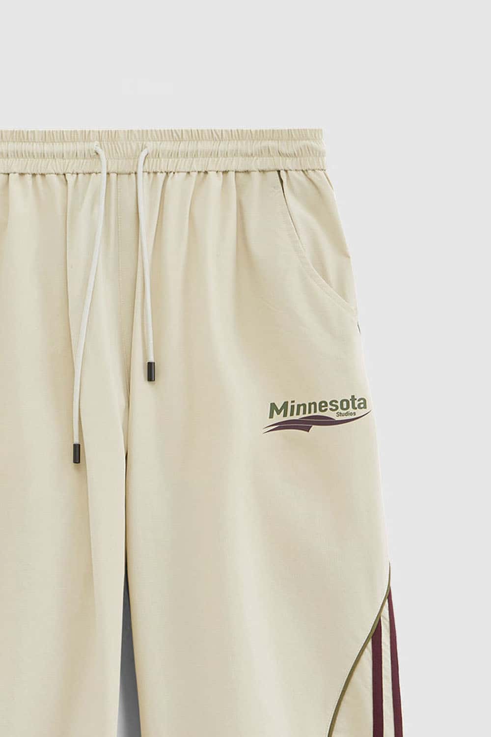 Curved-Panel Graphic Wide-Leg Pants in Light Khaki - waistband detail