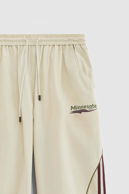 Curved-Panel Graphic Wide-Leg Pants in Light Khaki - waistband detail