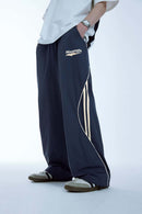 Curved-Panel Graphic Wide-Leg Pants in Royal Blue - front modeled view