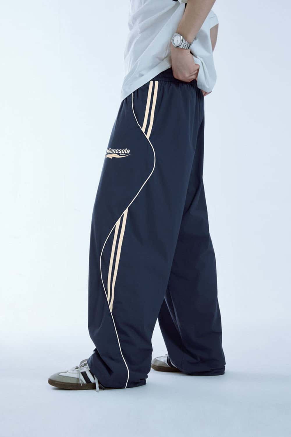 Curved-Panel Graphic Wide-Leg Pants in Royal Blue - side modeled view
