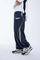 Curved-Panel Graphic Wide-Leg Pants in Royal Blue - rear three-quarter modeled view