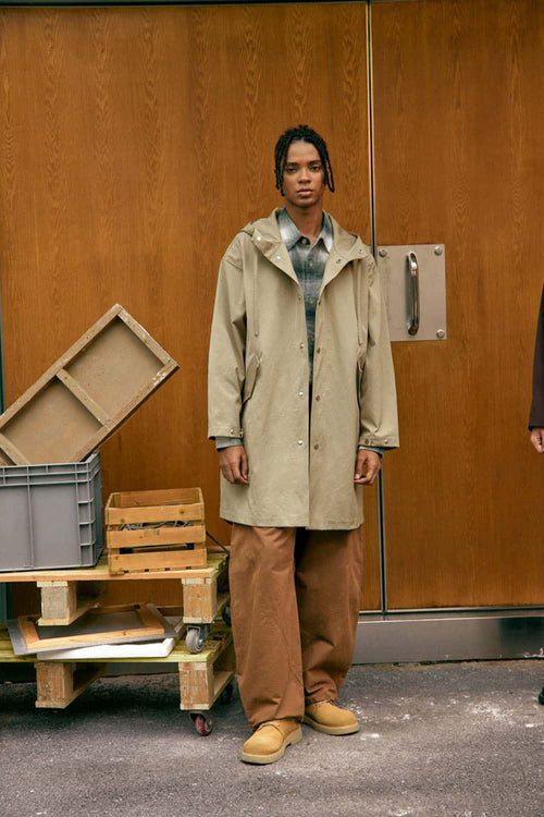 Waterproof Hooded Fishtail Utility Parka in Khaki - full-length front modeled view
