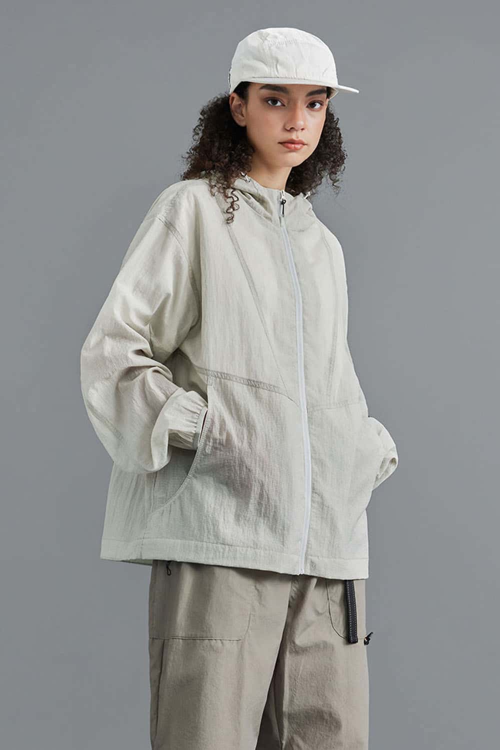 Lightweight Durable Nylon Hooded Utility Jacket in White - front modeled view