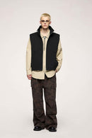 Two-Way Zip Drawcord Stand-Collar Utility Vest in Black - front modeled view