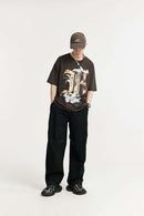 Washed Slub Cotton Wide-Leg Trousers in Black - front modeled view