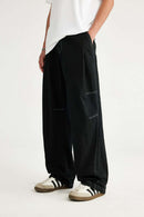 Washed Slub Cotton Wide-Leg Trousers in Black - product detail close-up
