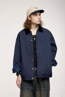 Corduroy-Collar Snap-Front Utility Jacket in Blue - three-quarter front modeled view