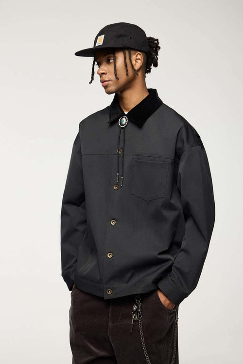 Corduroy-Collar Snap-Front Utility Jacket in Dark Gray - three-quarter front modeled view