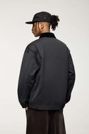 Corduroy-Collar Snap-Front Utility Jacket in Dark Gray - rear three-quarter modeled view