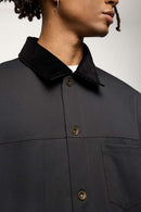 Corduroy-Collar Snap-Front Utility Jacket in Dark Gray - full-length front modeled view