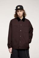 Corduroy-Collar Snap-Front Utility Jacket in Ebony Black - front modeled view