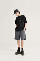 High-Colorfastness Washed Reversible Cotton Shorts in Rock Gray - full-length front modeled view